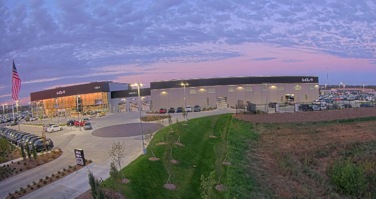 An image of an auto dealership at sunset taken by a TrueLook Construction Camera