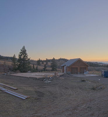 The start of a home build in the mountains captured by a construction camera