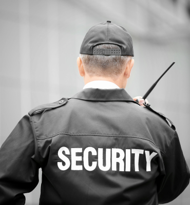 security guard talking on walkie talkie
