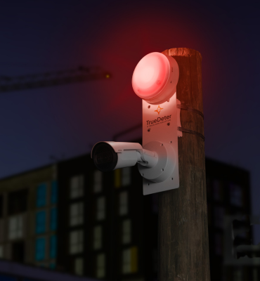 TrueLook security camera with a strobe light on mounted to a pole on a construction site
