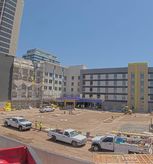 A hotel under construction with scaffolding on it captured by a TrueLook Construction Camera