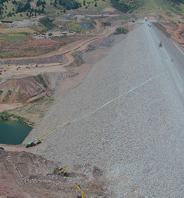 Almost completed Chimney Hollow Reservoir with equipment putting on the final touches in 2025 captured by a TrueLook Camera.