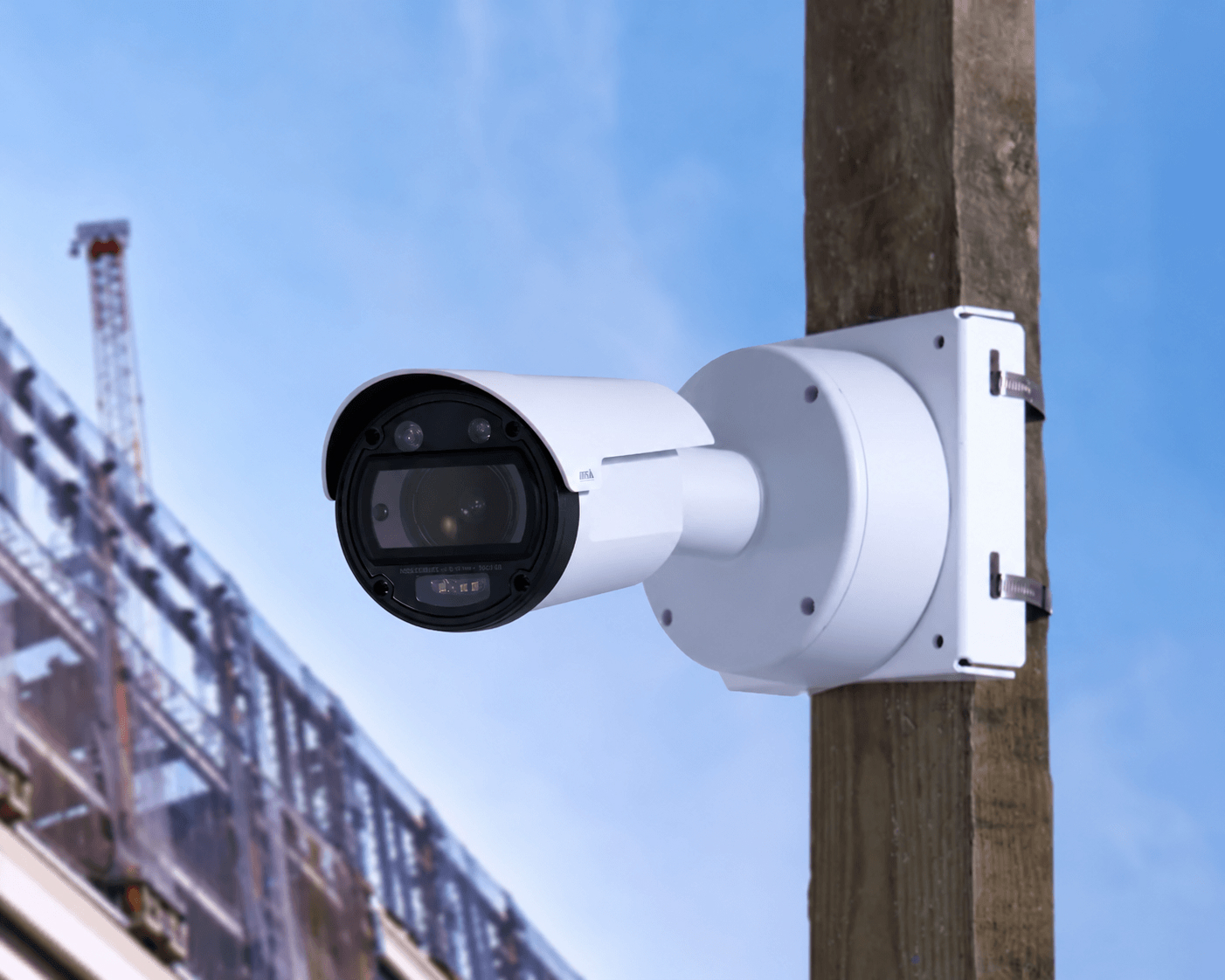 TrueLook 8K IR fixed camera mounted on a wooden pole at a construction site
