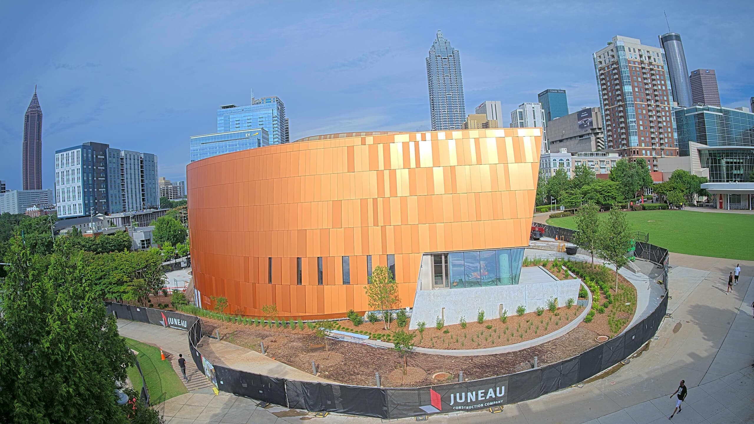Camera view of a copper-clad building under construction by Juneau in Atlanta