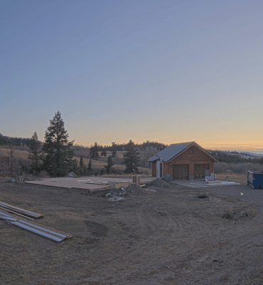 The start of a home build in the mountains captured by a construction camera