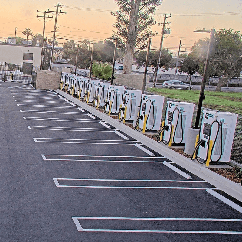 Row of EV fast chargers at a Terawatt Infrastructure fleet charging site