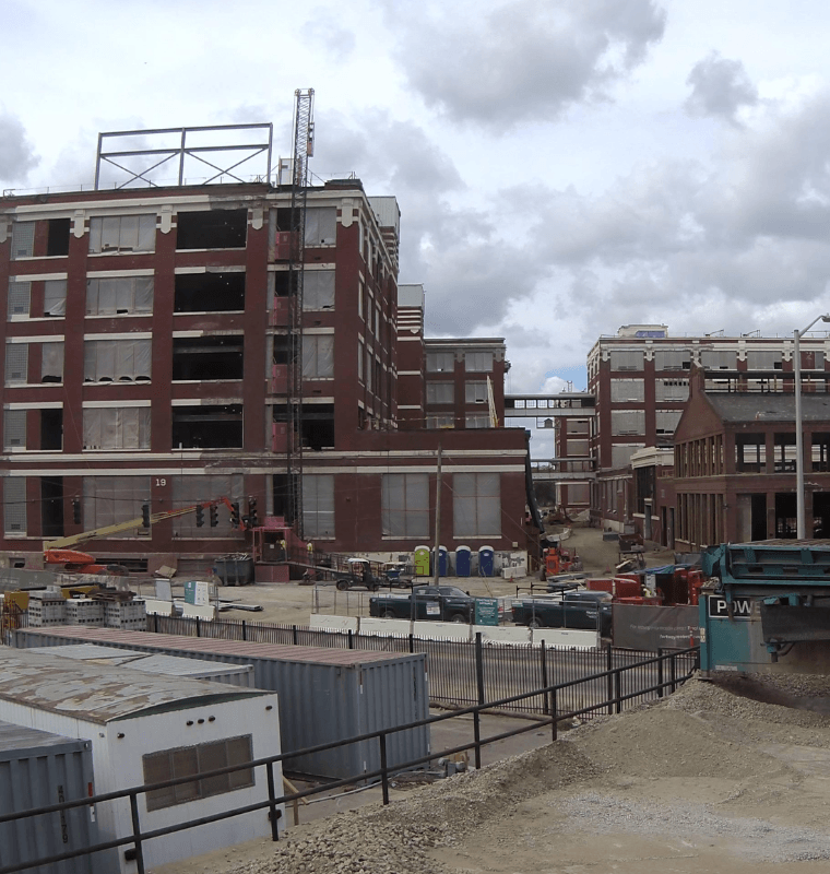 Camera view of a brick building renovation site