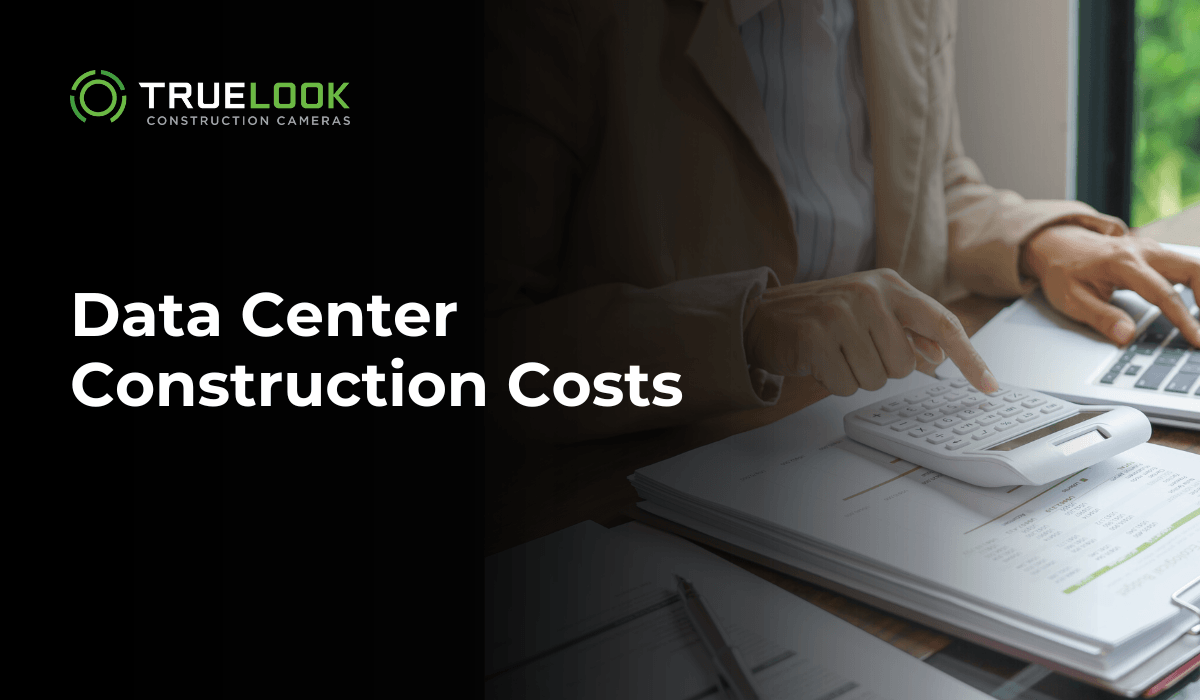 Data Center Construction Costs, with a person using a calculator