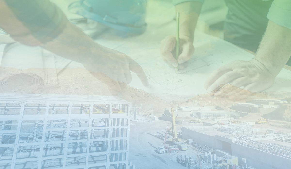 Hands sketching plans over a faded jobsite image