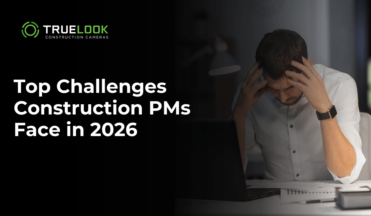 Top Challenges Construction PMs Face in 2026, with a stressed man at a desk