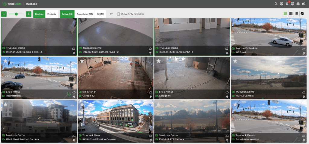 A screenshot of the TrueLook platform showing the multi-project dashboard with thumbnails of the live feeds from each construction camera