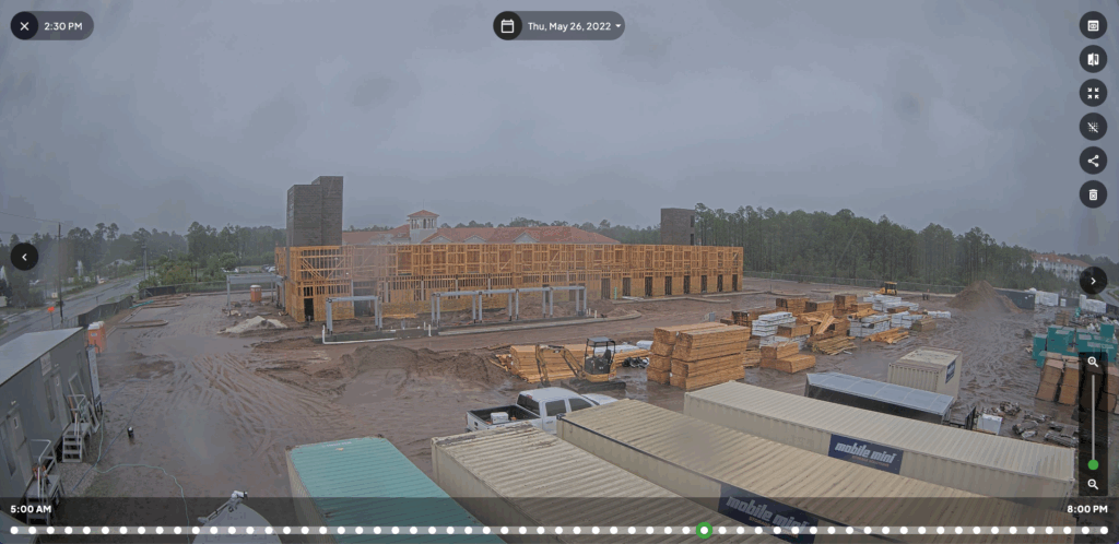 TrueLook platform showing how you can go back to a specific date and time and see what the jobsite looked like. It is rainy in this image.