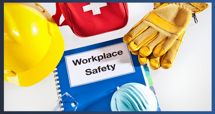 A yellow hard hat, a first aid kit, gloves, and a workplace safety manual to show construction site equipment needed on a construction site to stay safe