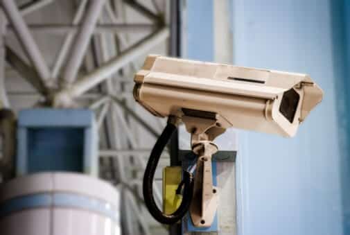 Security camera mounted inside a building