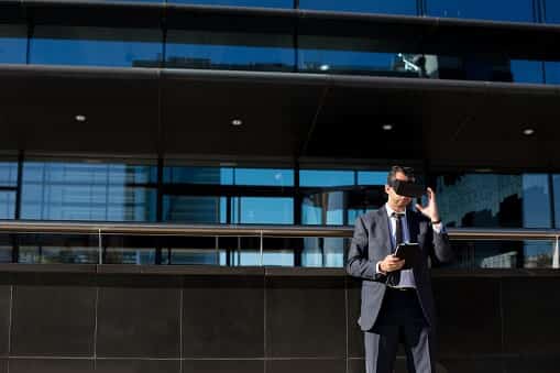Businessman wearing a virtual reality headset