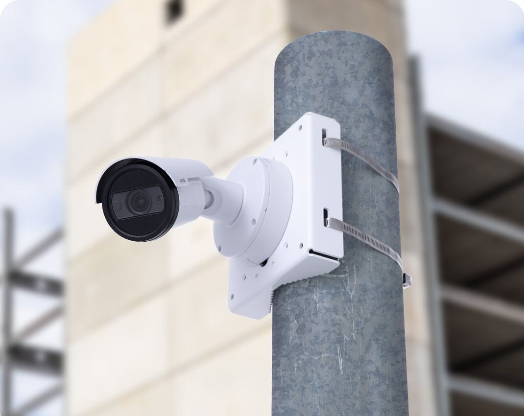TrueLook 4K IR fixed construction camera with white housing mounted on a concrete pole