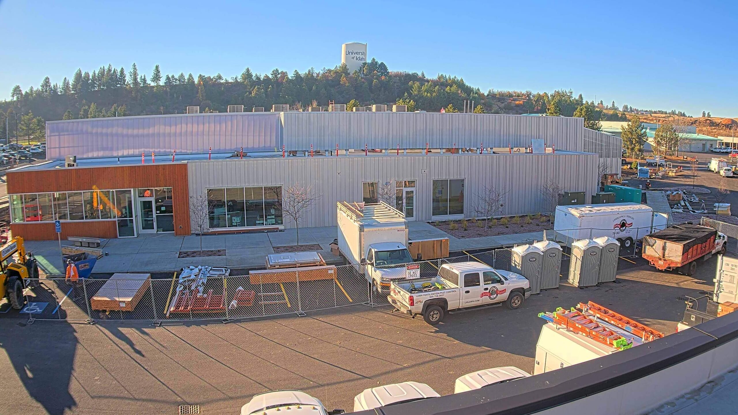 University of Idaho Meat Science and Innovation Center under construction with the hills and water tower in the background captured by a leased construction camera