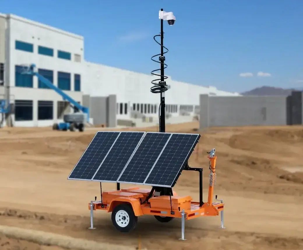 TrueLook mobile surveillance trailer with solar panels and mast camera on a jobsite