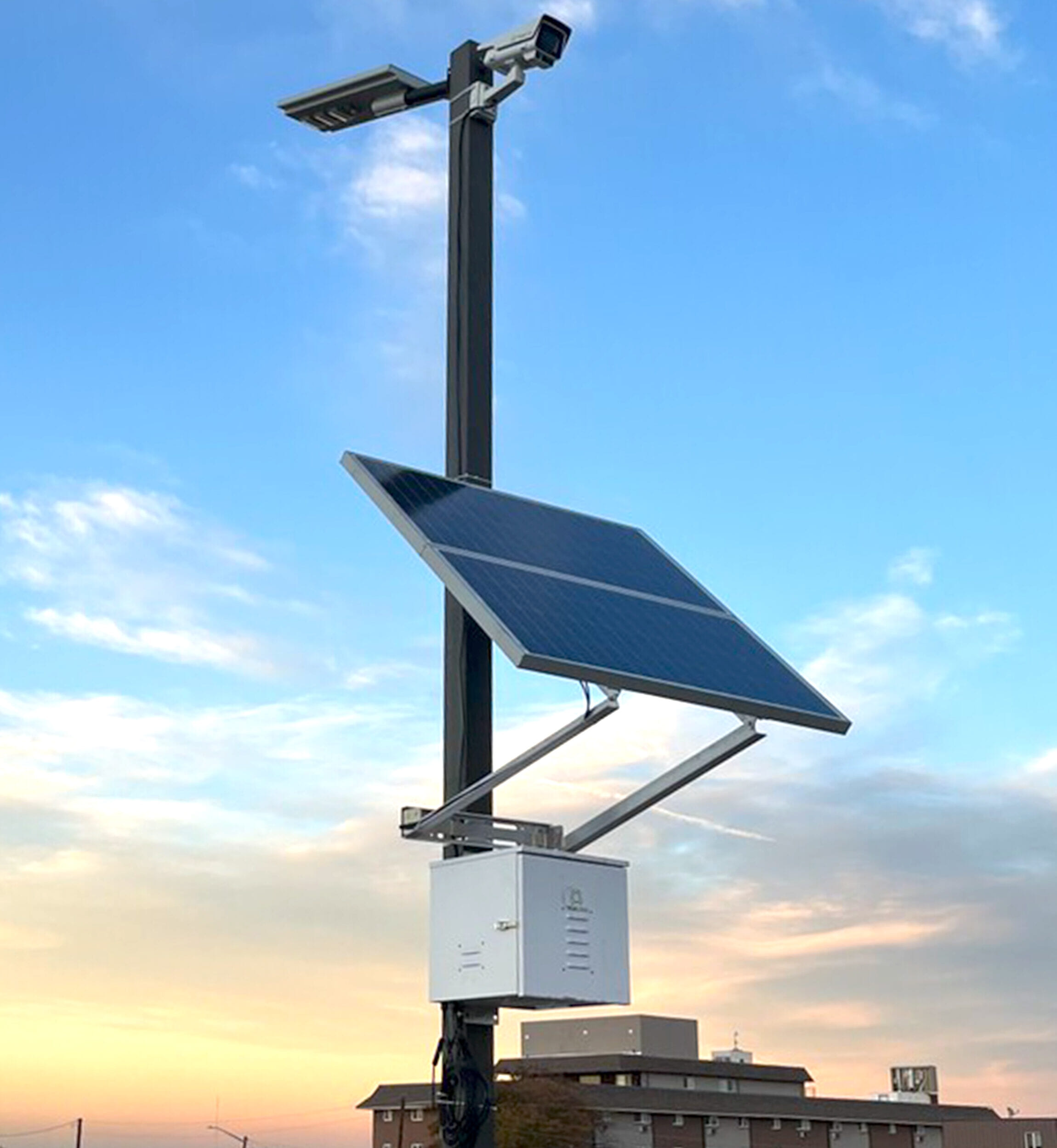 TrueLook solar package with a pole-mounted camera, solar panel, and equipment box
