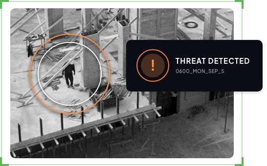 Graphic circling a trespasser on a construction site with an alert that says "Threat Detected" to show TrueLook's security solution