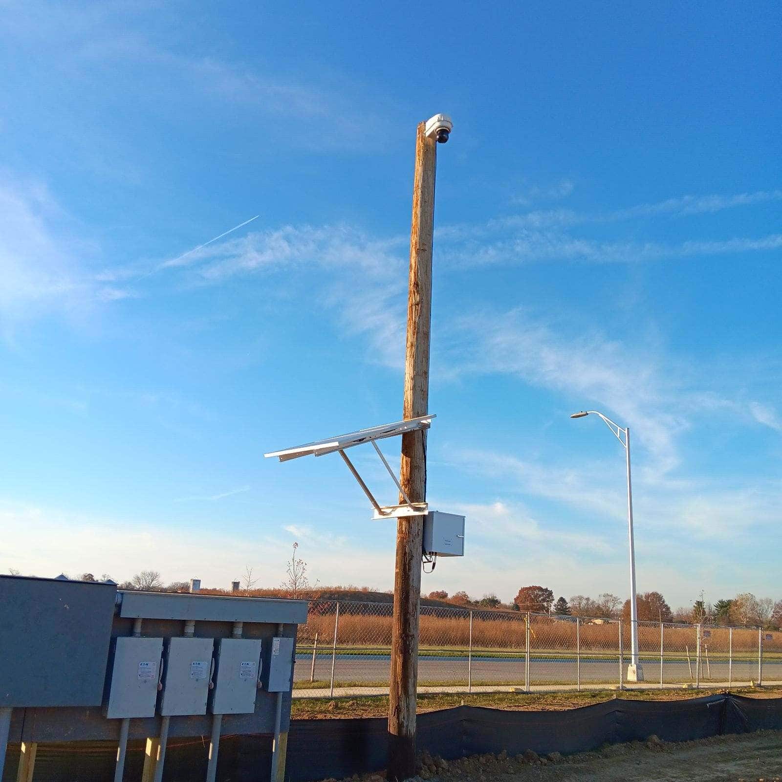 Solar PTZ camera pole mounted over a jobsite