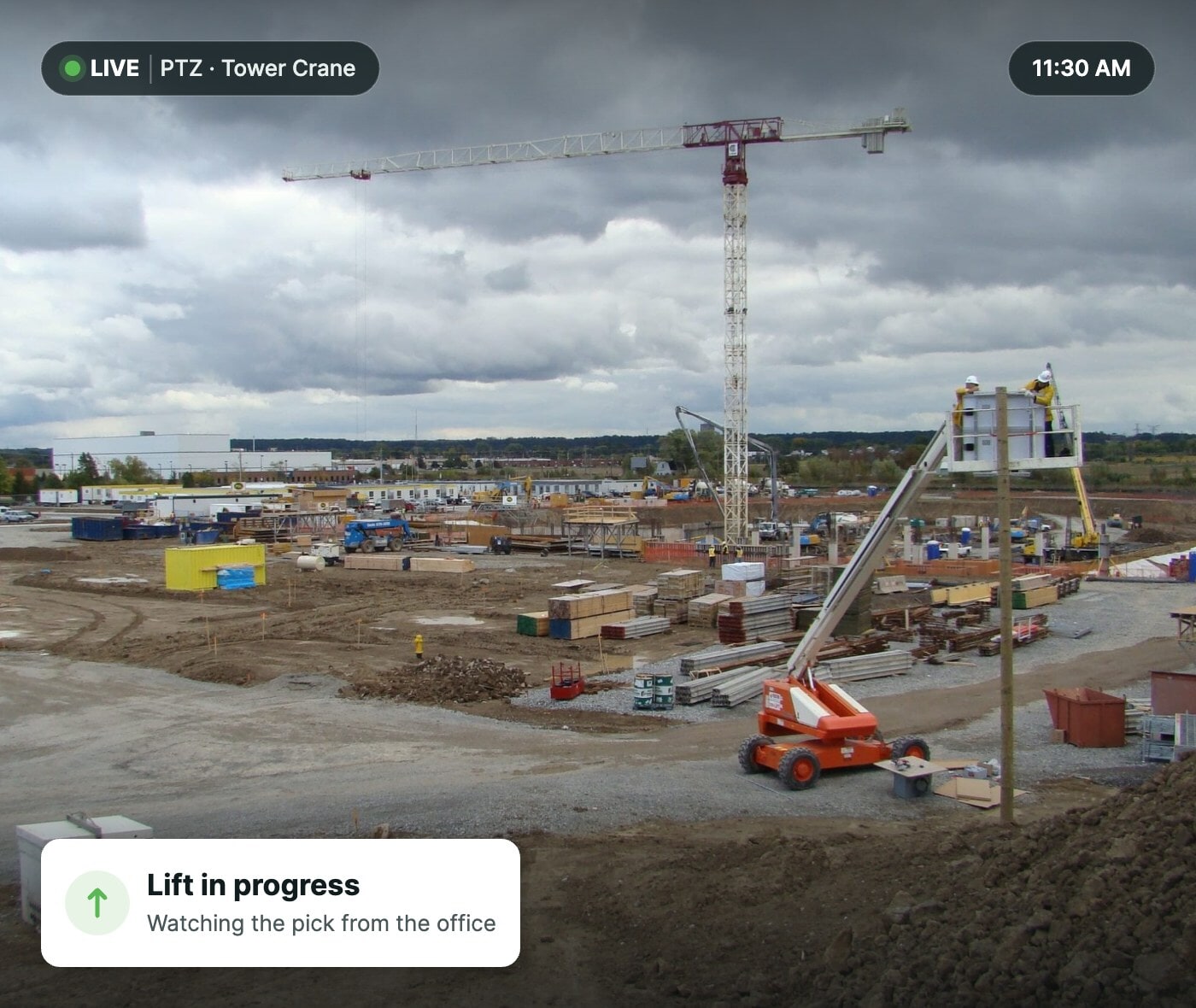 Live TrueLook camera view of a tower crane lift on a jobsite