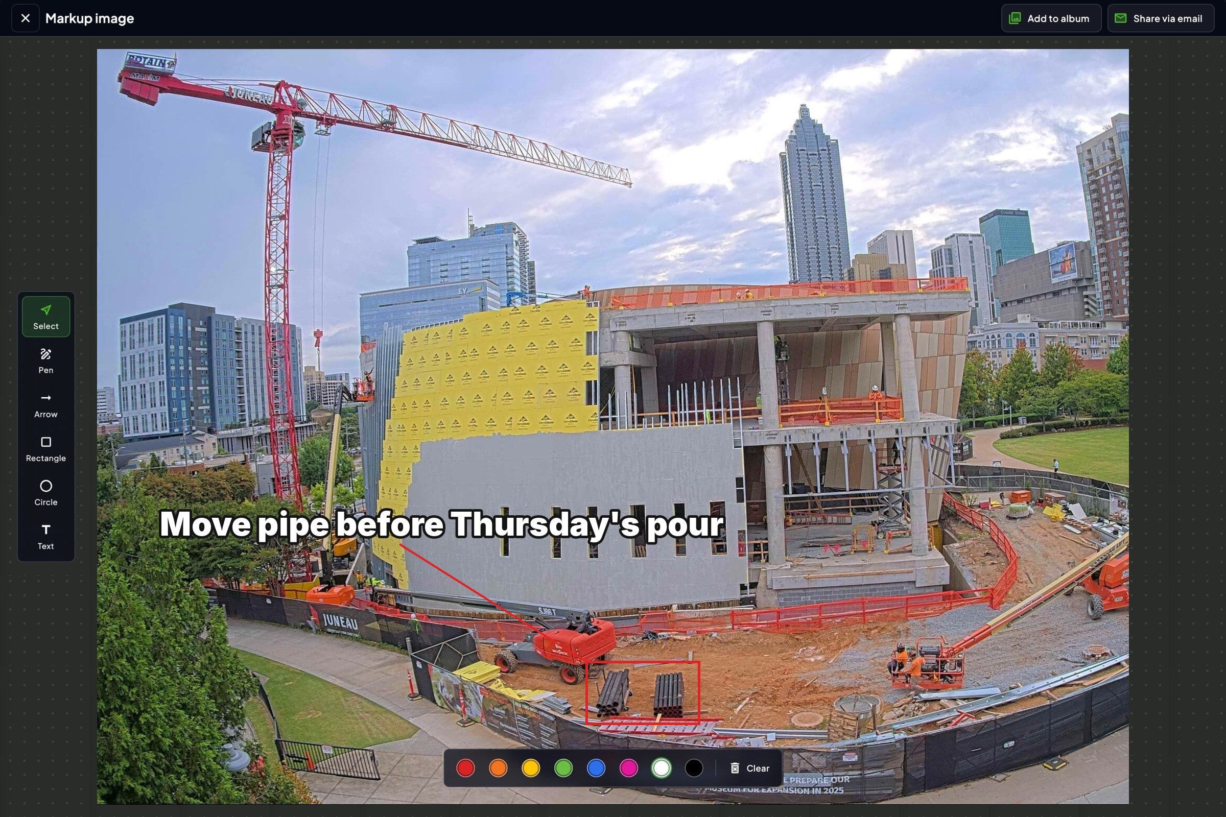Construction live cam snapshot marked up in TrueLook with a note to move pipe before the pour