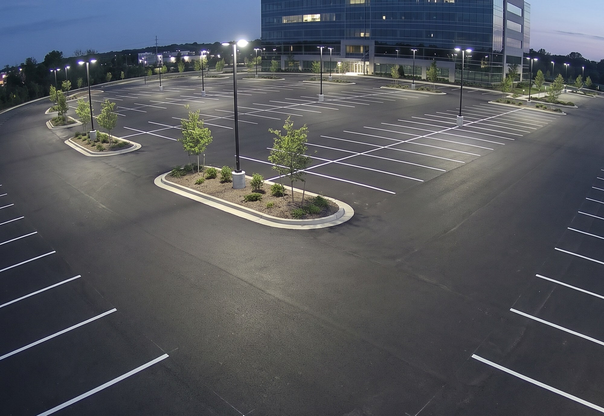 TrueLook security camera view of an empty parking lot at dusk