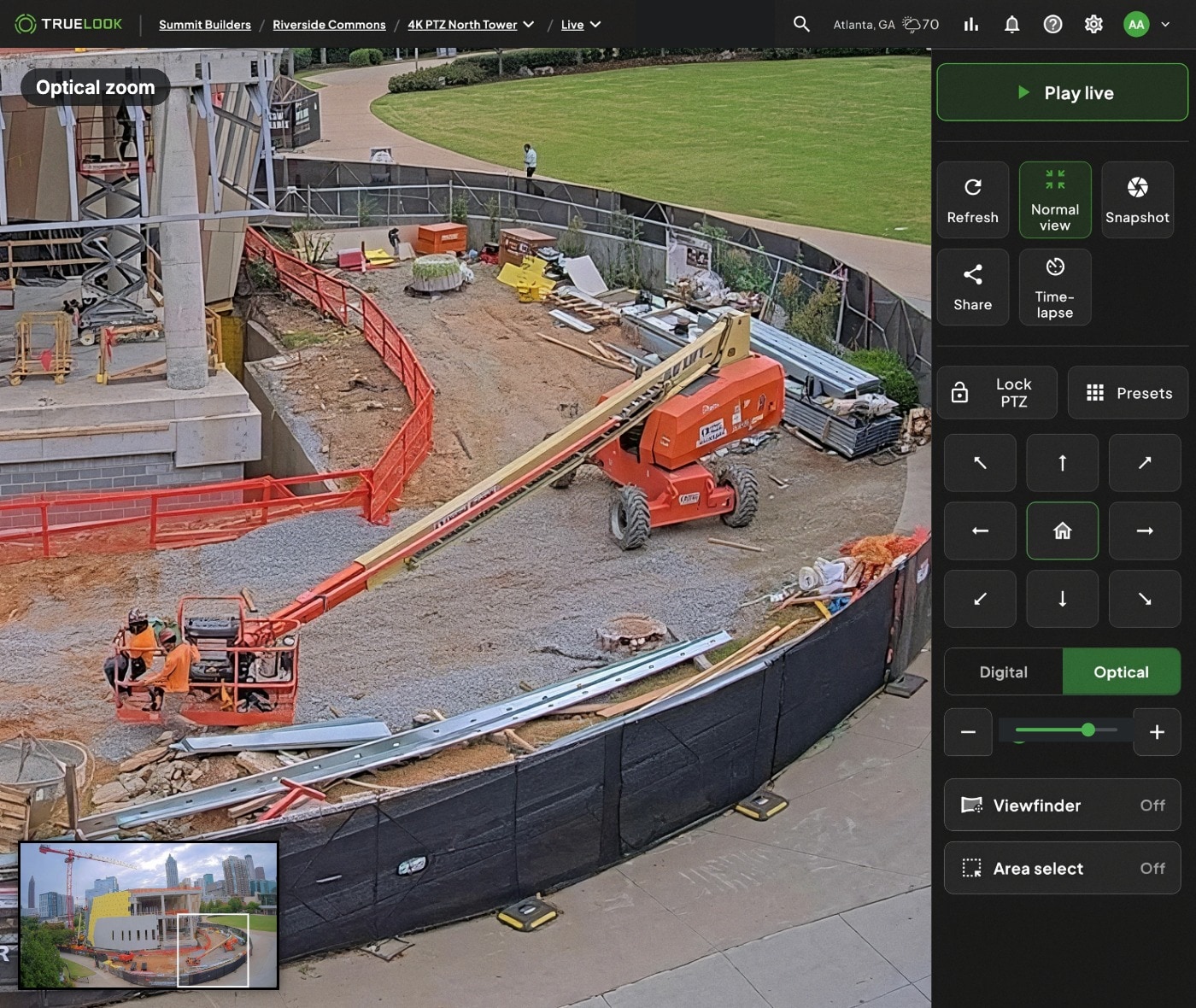 TrueLook PTZ camera zoomed in on workers and a boom lift with optical zoom controls