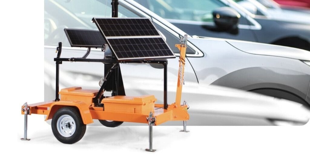 TrueLook solar mobile surveillance trailer in a dealership parking lot
